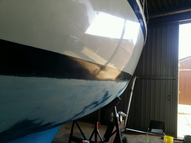 Tussenstand : primer aangebracht, 1 kant met cleaner en wax